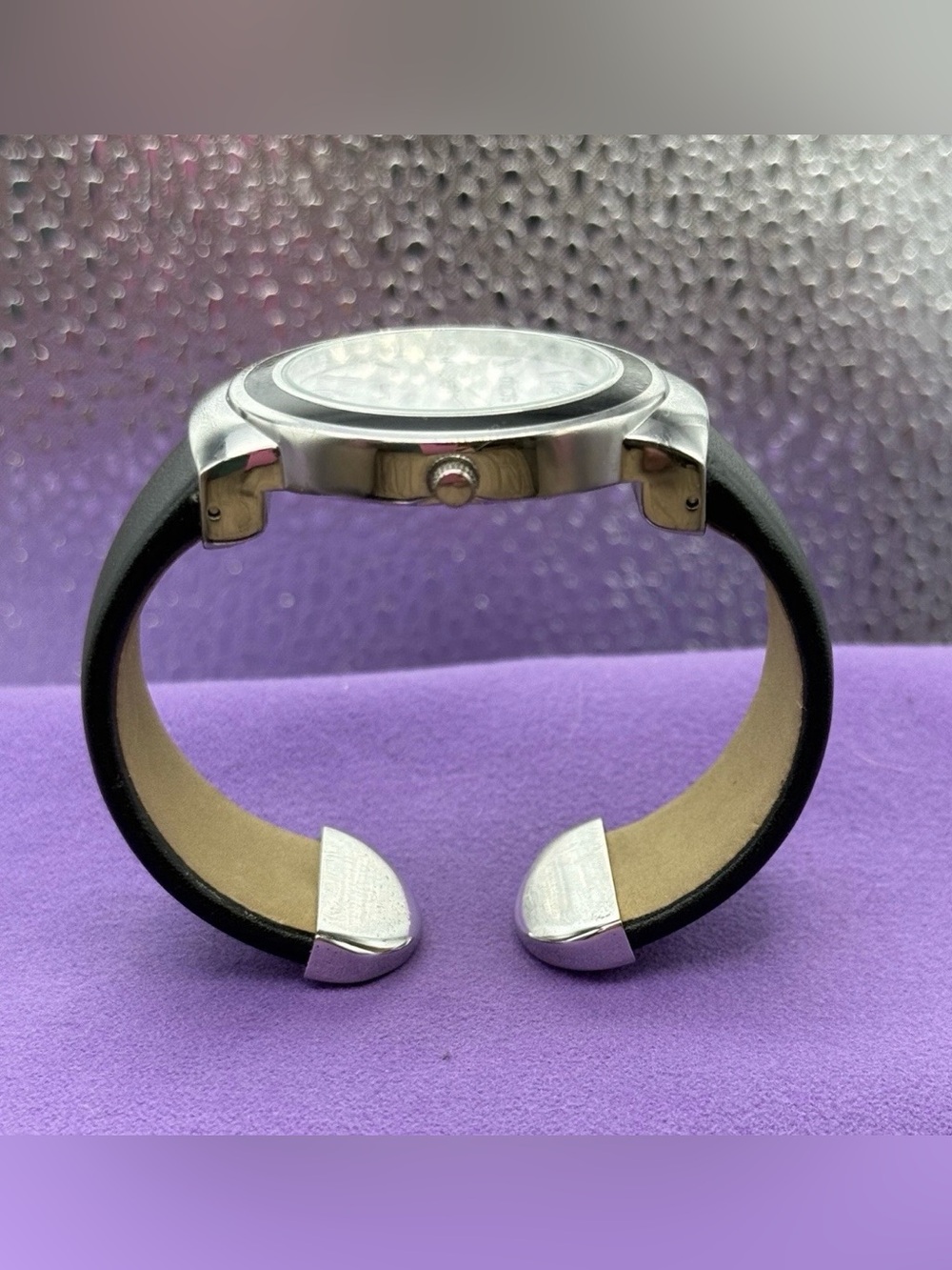 Chico Woman’s Quarts Cuff Watch Silver Tone ,Black Leather, Mother of Pearl Face